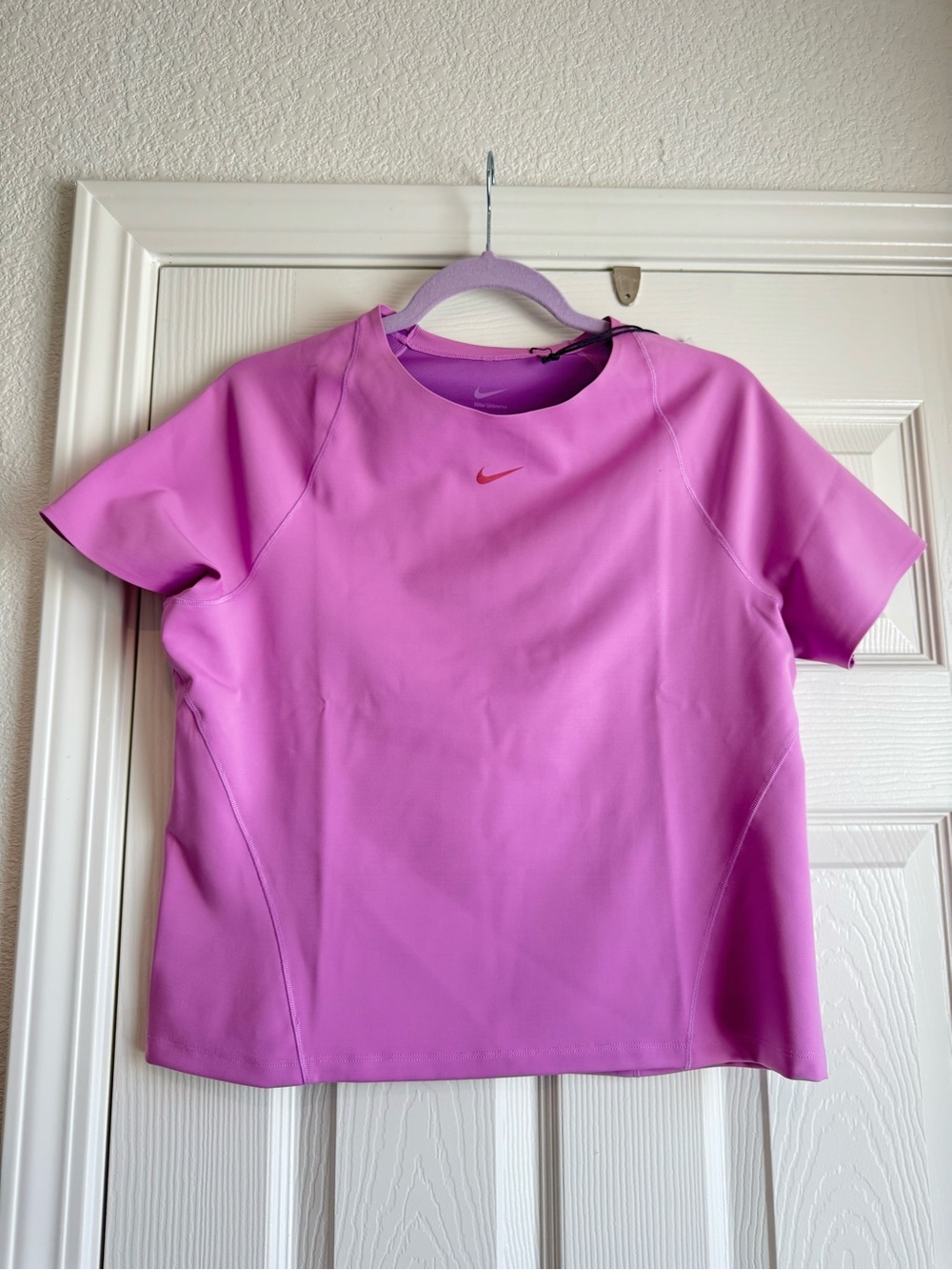Nike Women's Pink Short-Sleeve Athletic Top